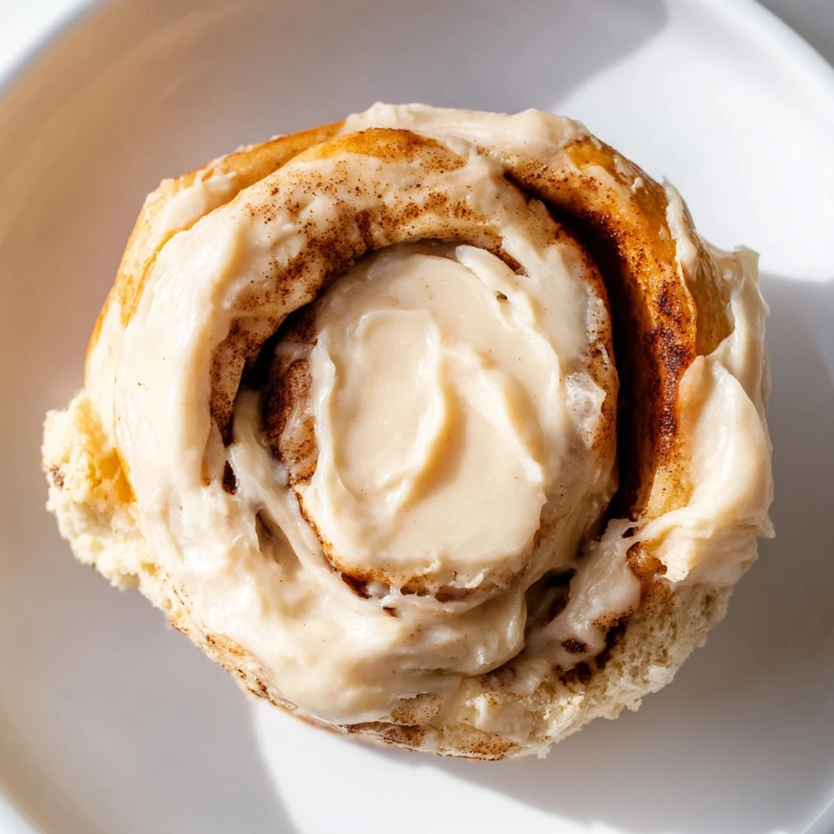 Gluten-free Keto Cinnamon Buns served with a cup of coffee for breakfast.