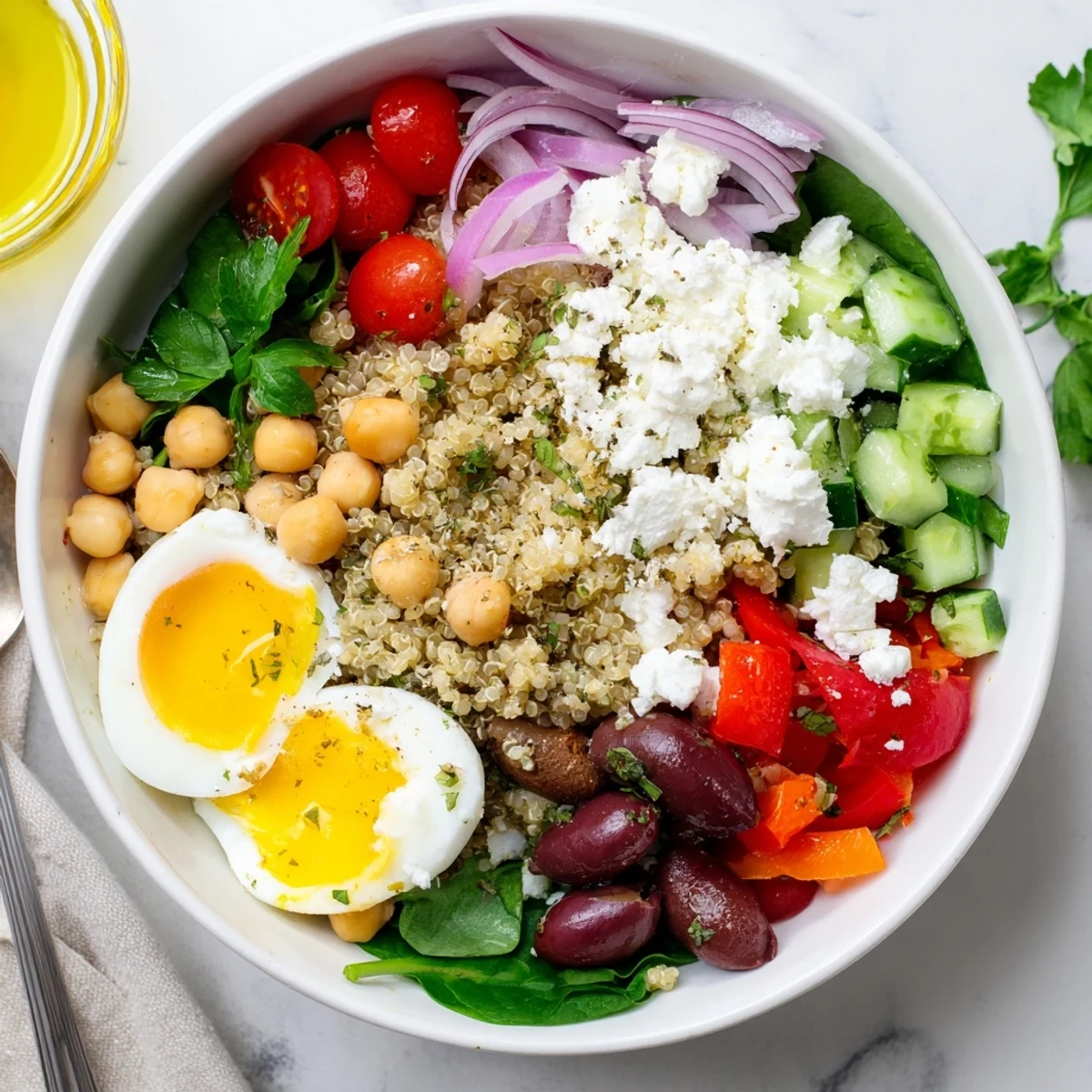 A vibrant photo of High Protein Mediterranean Breakfast Bowls featuring roasted red peppers, spinach, and lemon wedges ready for a quick, healthy morning meal.