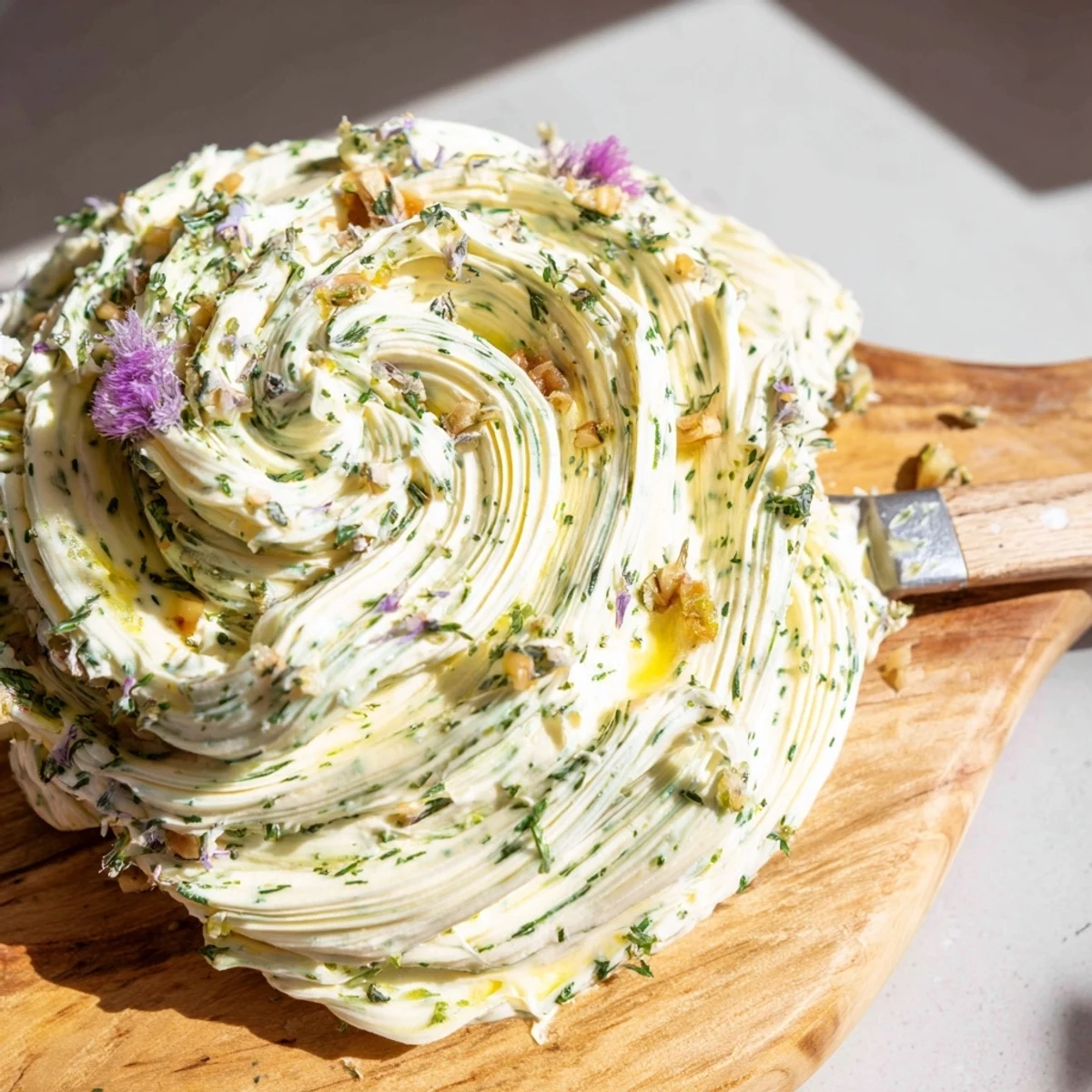Rustic Creamy Herb Infused Butter Board served with warm bread, nuts, lemon zest