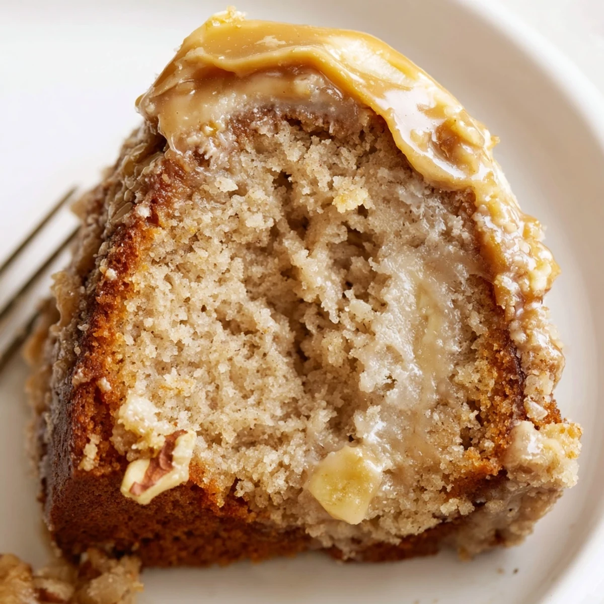 Salted Caramel Brown Butter Banana Cake with glossy caramel drizzle and sea salt