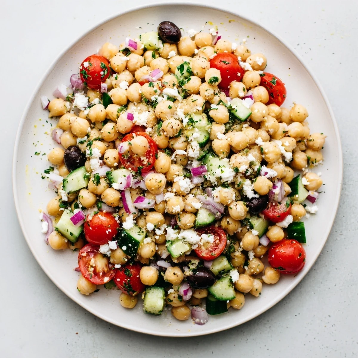 Mediterranean Chickpea Salad with Cucumber & Feta tossed in lemony dressing