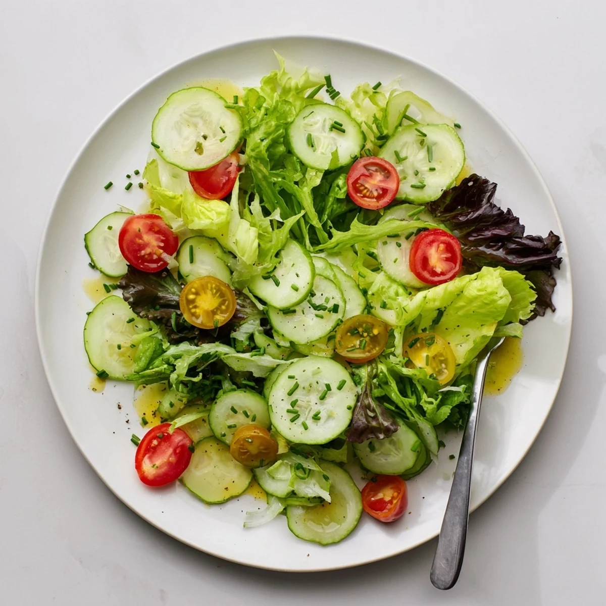 Simple Green Salad Recipe with crisp mixed greens, cucumber, and tangy vinaigrette  