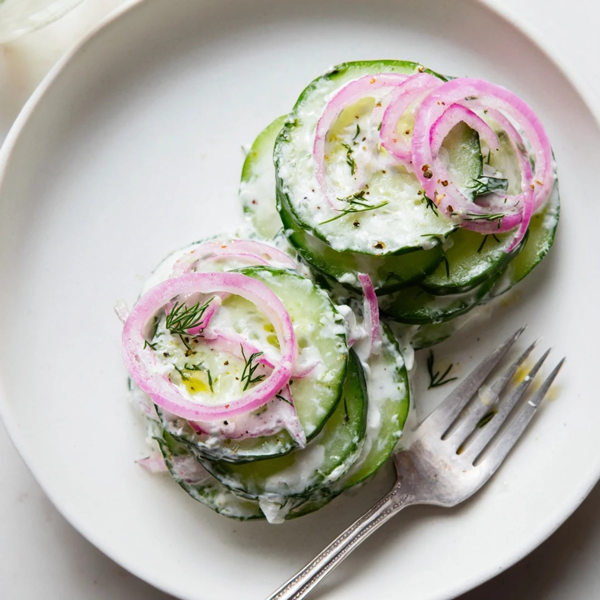 Chilled Tzatziki Cucumber Salad Recipe served with pita, lemon brightness, crunchy slices.