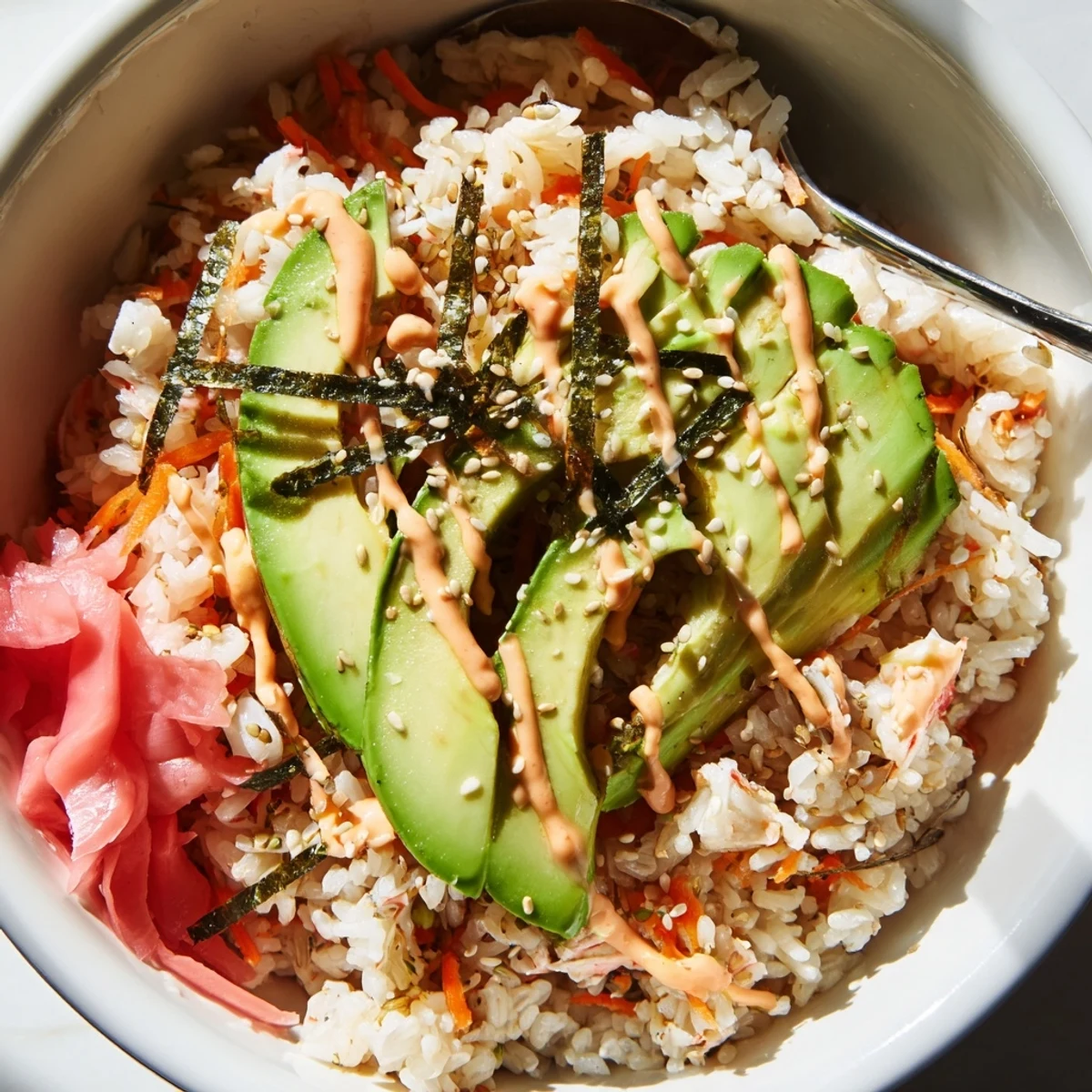 Deconstructed California Roll Sushi Bowls on rice bed, pickled ginger, soy