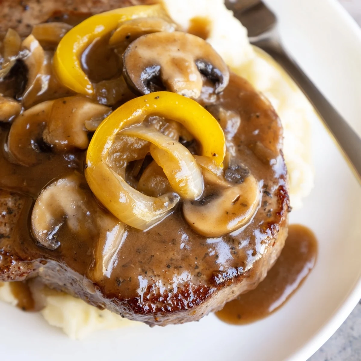 Country Style Smothered Cube Steak Recipe: tender steaks in brown onion mushroom gravy