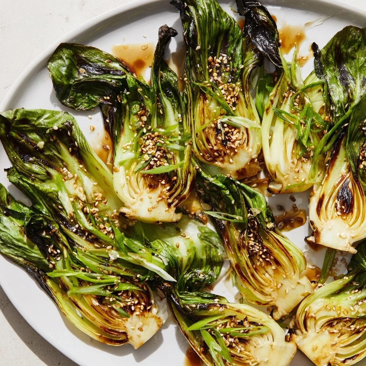 Caramelized Garlic Bok Choy sizzles in a hot wok with golden brown garlic slices and glossy sauce