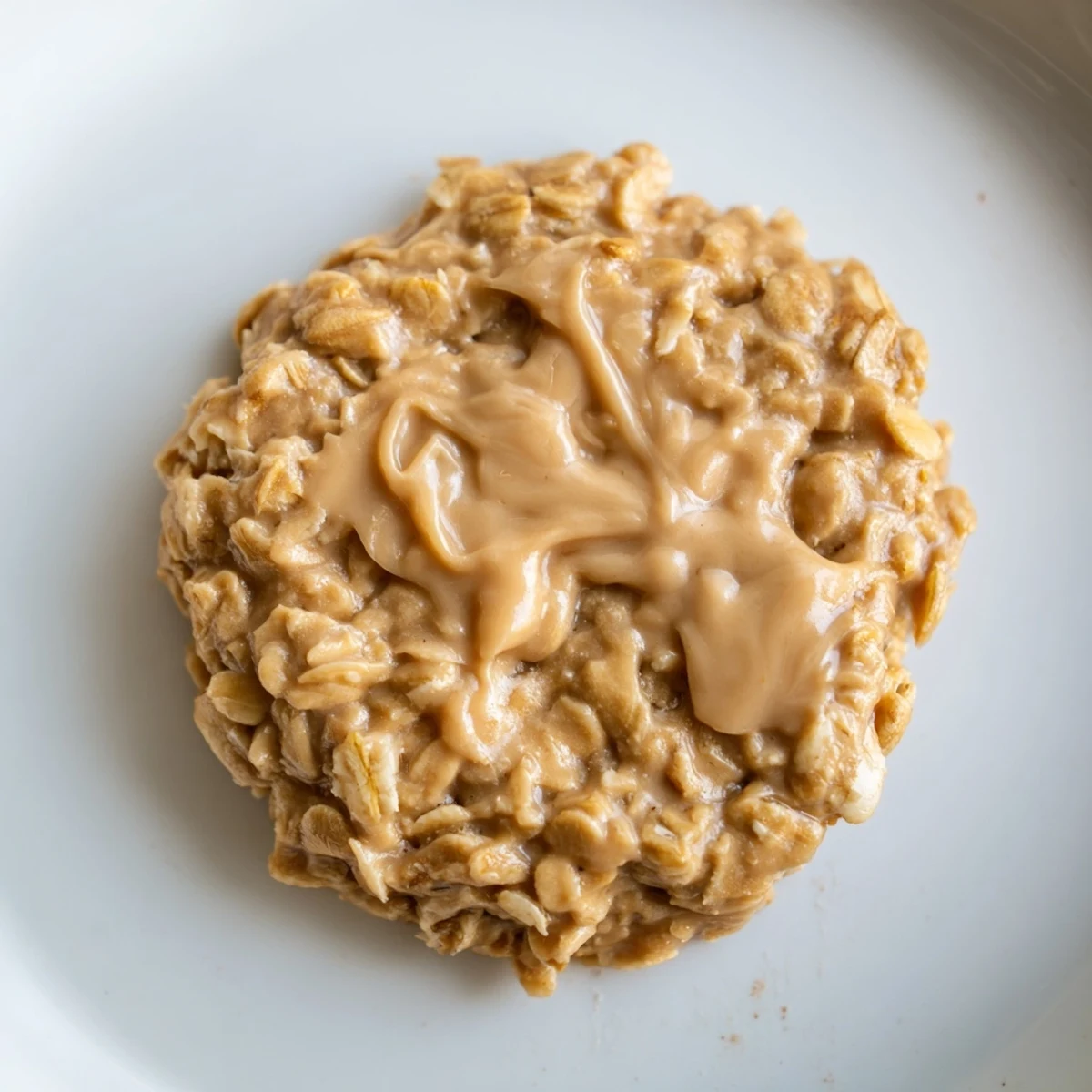 Stack of homemade peanut butter no bake cookies ready for a quick sweet treat.